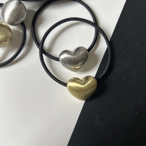 Black elastic hair ties with brushed gold and silver heart and ball metal charms