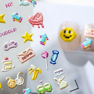 3D embossed pixel art nail stickers featuring colorful hearts, stars and cartoon motifs
