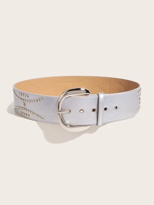 Detail of silver PU leather belt with metal rivets, D-ring buckle and textured finish