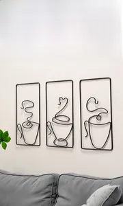 Three-piece black iron wire wall art set featuring minimalist coffee cup line drawings