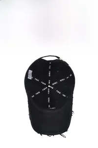 Detailed interior of black distressed baseball cap with FBKS webbing and frayed brim edge