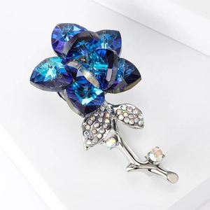 Elegant silver rose brooch with blue gradient crystal petals and sparkling clear rhinestones