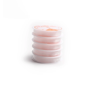 Vertical stack of five 0.6mm transparent crystal elastic cords for DIY jewelry making