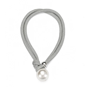 Close-up of double-layer choker with woven silver cord and large lustrous white pearls