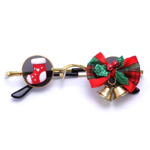 Christmas Y2K sunglasses with gold frame, festive red-green bow, bells and stockings charms