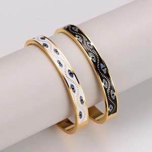 Vintage evil eye drip oil open bangles in gold finish with black and white enamel