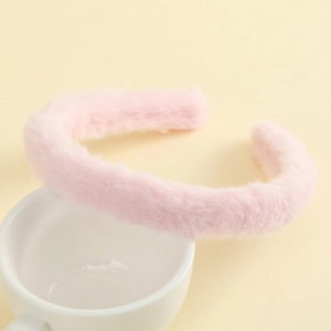 Cute pink faux fur headband accessory for women with soft plush texture and sweet style