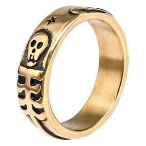 Retro gold skull ring with star patterns and oxidized finish on polished stainless steel