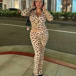 Detailed close-up of leopard print hooded cardigan and high waist leggings fabric texture