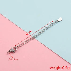Macro shot of a 6cm stainless steel extender chain with lobster clasp and measurements