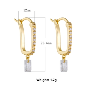 Detail view of U-shaped gold earrings with zircon stones and dimensions 12mm by 22.5mm