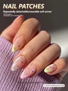 Detailed view of long press-on nails with wave patterns and silver star sequins