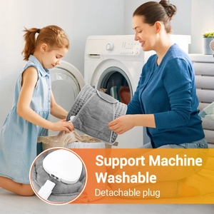 Detail showing machine washable heating pad feature with a detachable power plug connector