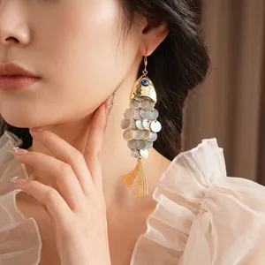 Vintage shell fish scale long fringe earrings in golden metal and iridescent mother of pearl