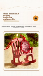 Close-up of red wooden Christmas memorial rocking chair with Heaven poem plaque