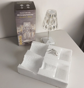 Unboxing detail of crystal diamond touch lamp with USB cable and packaging box