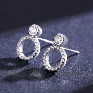 Minimalist S925 sterling silver stud earrings featuring round cubic zirconia in silver