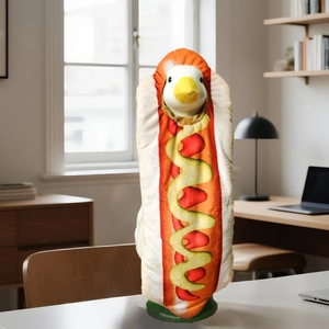 Close-up of hot dog style plush costume for porch goose with vivid yellow and red details