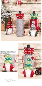 Detail of Christmas gnome wine bottle covers with knitted fabric and snowflake patterns