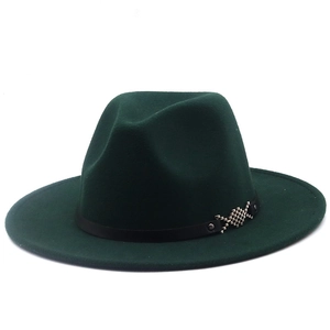 Detail of dark green wool fedora hat with black leather band and silver metal buckle