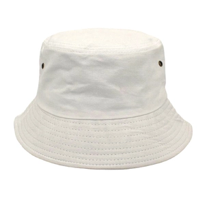 Detail view of white cotton bucket hat with breathable metal eyelets and reinforced stitching