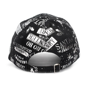 Close-up of black baseball cap featuring silver Santa Claus print and adjustable metal buckle