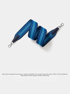 Blue geometric woven shoulder strap with silver swivel hook and dark blue leather detail
