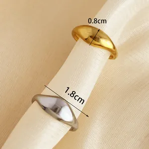 Polished minimalist 18k gold and silver stainless steel rings with 8mm band width