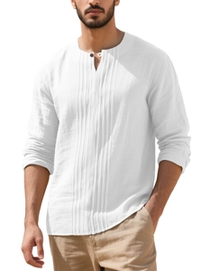 Close-up of white linen cotton shirt featuring pleated texture and buttoned henley collar