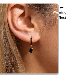 Wearing effect of square black zircon dangle earrings with gold plated hoop and micro stones