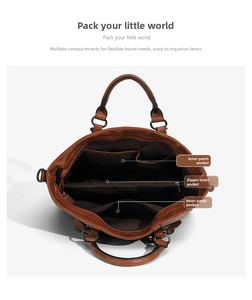 Macro view of the large capacity interior compartments of the brown leather tote bag