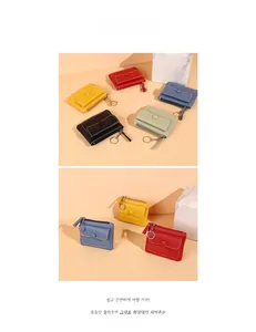 Detailed view of colorful slim wallets featuring zipper pocket and snap-button storage pouch
