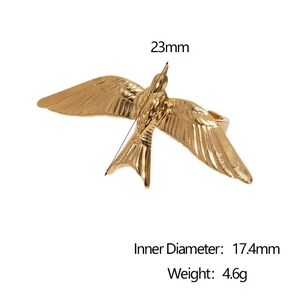 Golden bird wing stainless steel open ring with detailed eagle feathers on white background