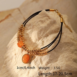 Detail view of Bohemian multilayer necklace with orange natural stone and gold beads