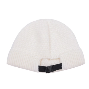 Detail of off-white waffle knit beanie featuring adjustable back strap and plastic buckle