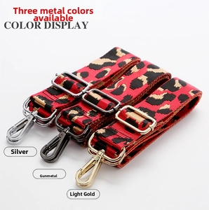 Detailed leopard print bag straps with adjustable silver, gunmetal, and light gold hooks
