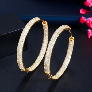 Classic 18K gold plated hoop earrings with full pave cubic zirconia on a dark setting