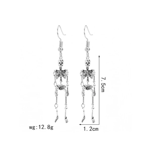 Detailed view of gothic skeleton drop earrings with measurements 7.5cm long and 1.2cm wide