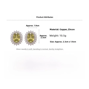 Detail view of oval yellow zircon earrings with dimensions and silver needle material