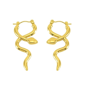 Macro view of gold snake hoop earrings with detailed texture and polished metal finish