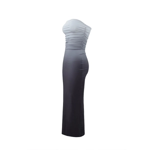 Detail of ruched texture and gradient grey to black fade on a strapless bodycon dress