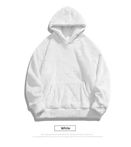Close-up of white hooded sweatshirt in soft fleece texture with front pocket and ribbed cuff