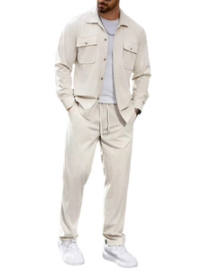 Detail of men's beige two-piece set featuring waffle texture fabric and chest pockets
