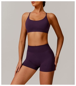 Detail of plum seamless yoga set featuring wide ribbed waistband and high elastic fabric