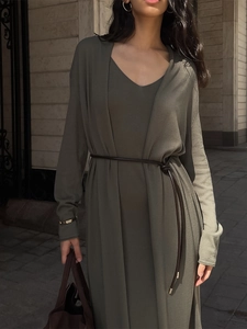 Detail of dark olive green knit long-sleeve cardigan and dress set with slim belt