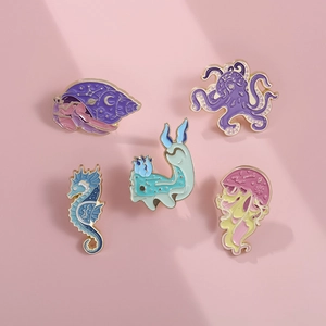5-piece set of sea animal enamel pins featuring octopus, seahorse and jellyfish icons