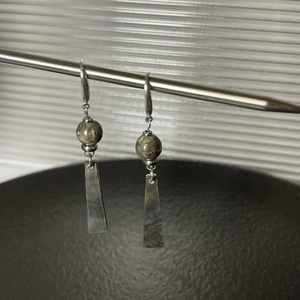 Natural pyrite and black shell drop earrings with silver hooks in minimalist style