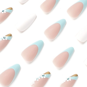 Blue French almond press-on nails with matte white finish and 3D rhinestone flower design