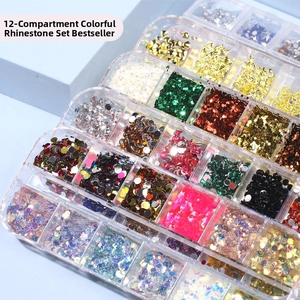 Detail view of 12-slot organizer box with mixed rhinestones and charms for nail art