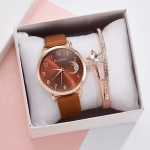 Close-up of women's quartz watch with moon dial and zircon star bracelet in a gift box